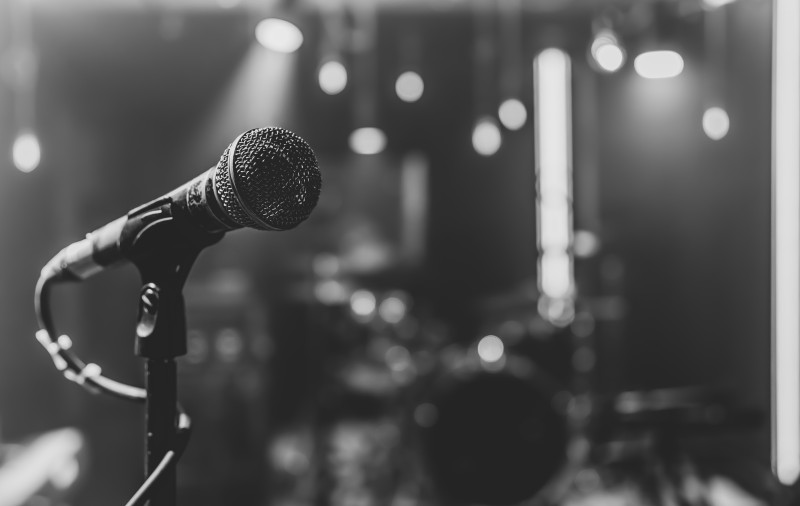 close-up-of-microphone-on-concert-stage-with-beautiful-lighting-16259